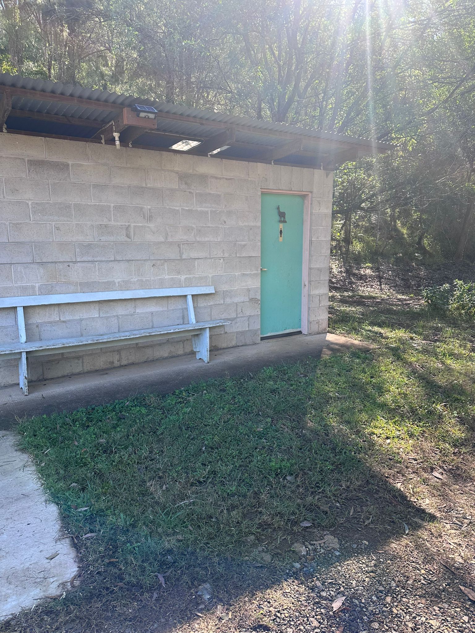 On-site amenities block with seating at Wattle Grove Park